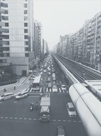 High angle view of vehicles on street in city