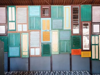 Multi colored doors in building