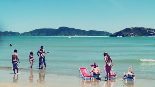 Tourists enjoying at beach