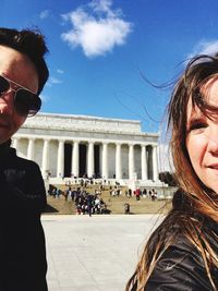 Tourists in front of historical building