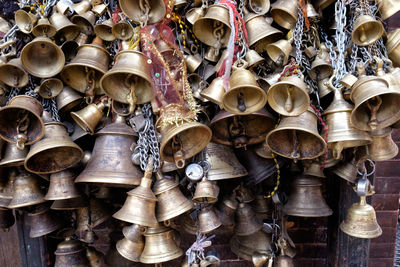 Full frame shot of bells for sale at market