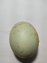 Close-up of apple against white background