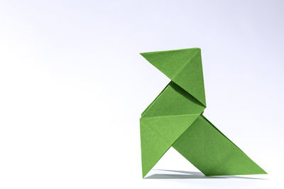 High angle view of paper toy against white background