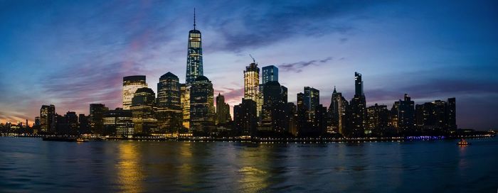 City lit up at dusk