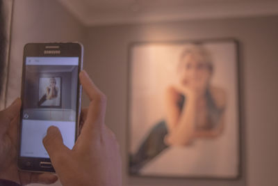 Close-up of woman using smart phone