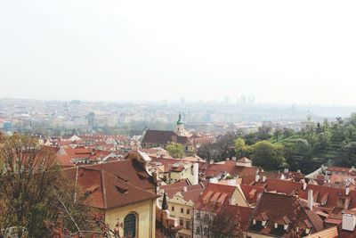 Aerial view of cityscape against clear sky