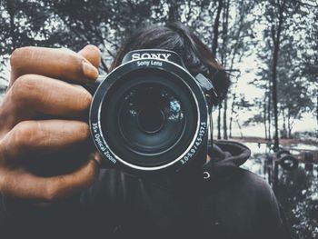 Man photographing with camera