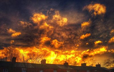 Low angle view of cloudy sky at sunset