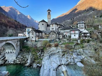 Buildings at waterfront in lavertezzo