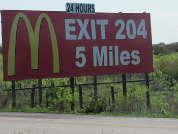 Low angle view of information sign