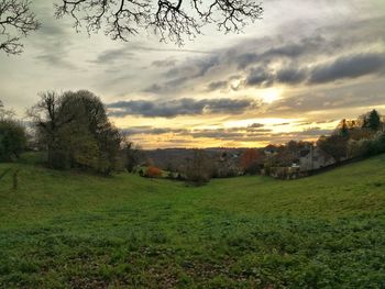 Scenic view of landscape against sky during sunset
