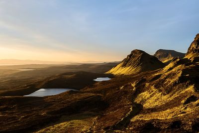 Scenic view of mountains against sky during sunset