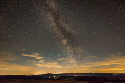 Scenic view of star field against sky at night