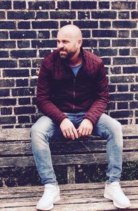 Portrait of man sitting outdoors