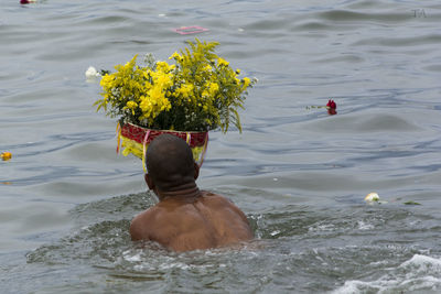 Person swimming in sea