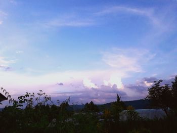 Scenic view of landscape against cloudy sky