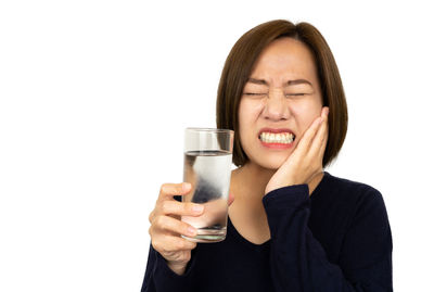 Portrait of a woman drinking glass