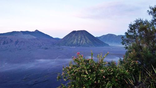 Scenic view of volcanic mountain against sky