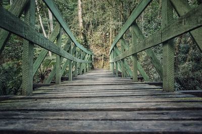 Empty footbridge in forest