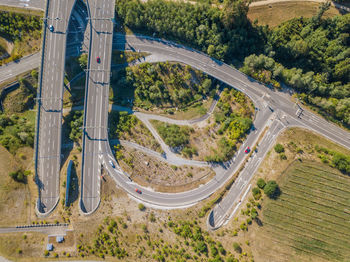 High angle view of highway amidst trees