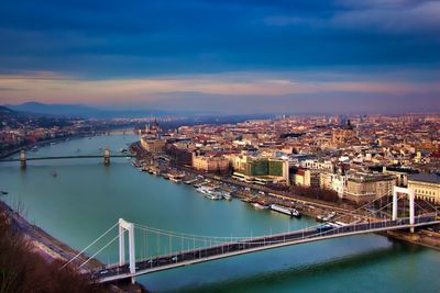 High angle view of bridge over river against cloudy sky