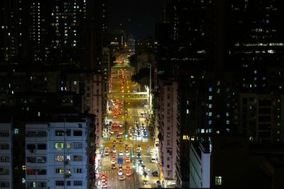 Illuminated buildings in city at night