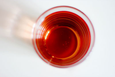 High angle view of red glass on table