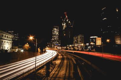 Light trails on city street at night