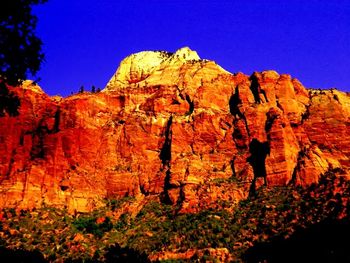 Scenic view of rocky mountains against clear sky