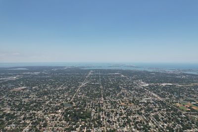 High angle view of buildings against clear sky