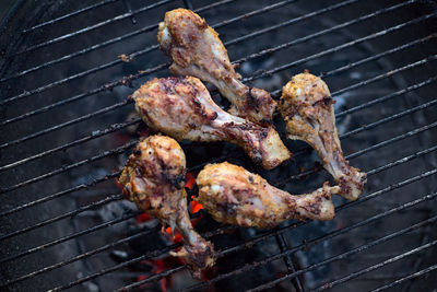 Close-up of meat on barbecue grill