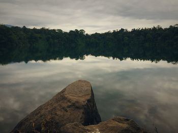 Reflection of clouds in calm lake