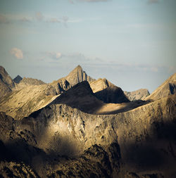 Scenic view of rocky mountains against sky