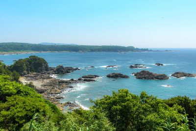 Scenic view of sea against clear blue sky