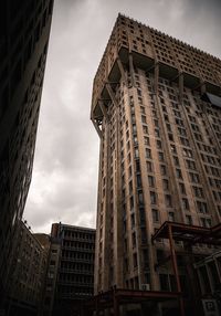 Low angle view of modern buildings against sky in city