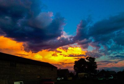 Low angle view of cloudy sky at sunset