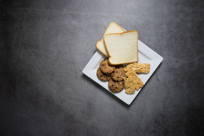 High angle view of cookies in plate on table