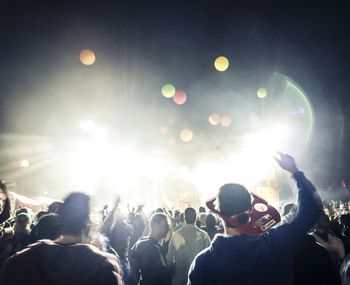 People enjoying music concert