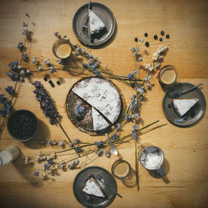 High angle view of clock on table