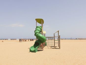 Slide on beach