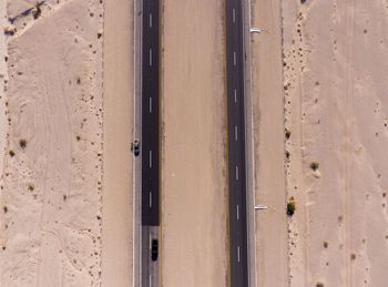 Aerial view of road at desert