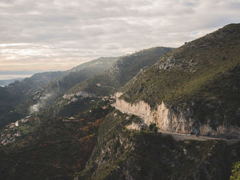 High angle view of mountain range against cloudy sky