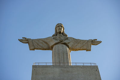 Low angle view of statue against clear sky