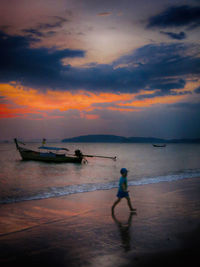 Scenic view of sea at sunset