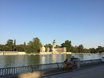 Bridge over river against clear sky