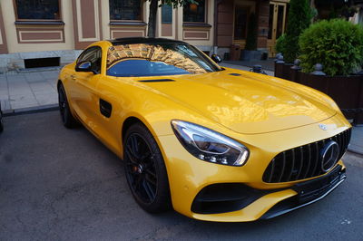 Yellow car on road