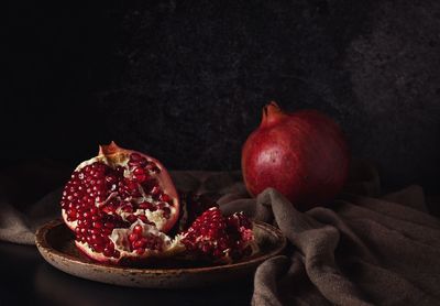 Close-up of strawberries in plate on table