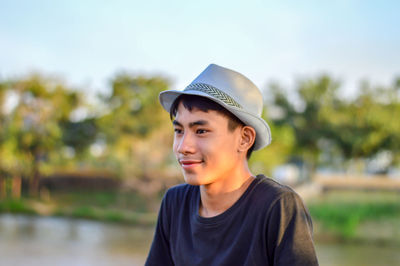 Portrait of teenage boy looking away