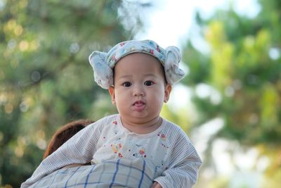 Portrait of cute baby outdoors