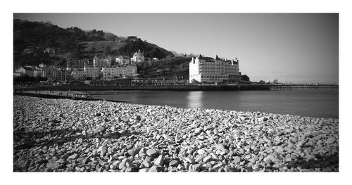 Scenic view of beach against clear sky